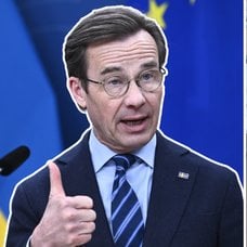 Ulf Kristersson och barn i skolan