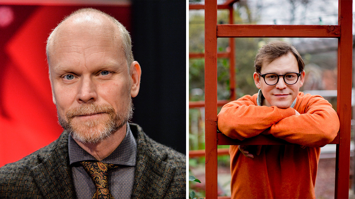 rakad man i kostym, man i orange tröja hänger mot en röd stege