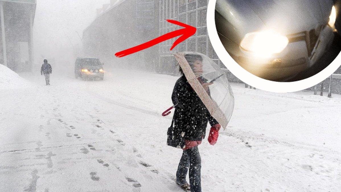 snokaos, bil med helljus, kvinna med paraply