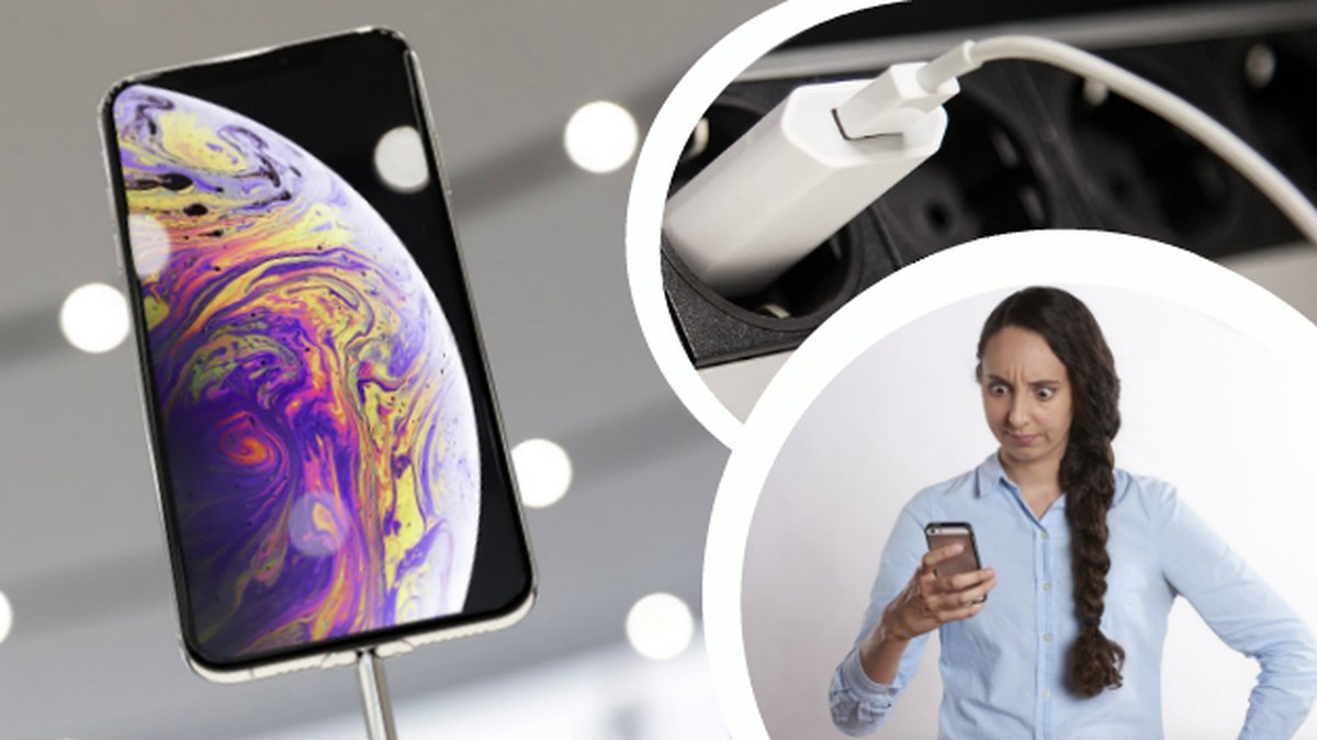 Nya iPhone XS en förvånad tjej som tittar i sin telefon. en mobilladdare