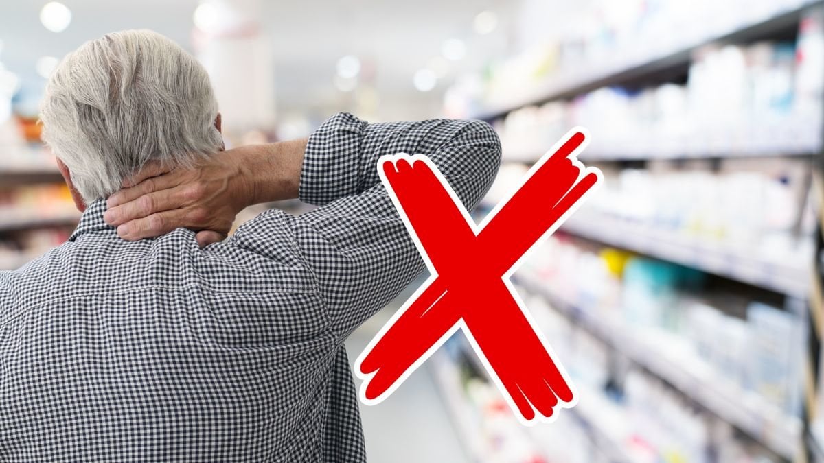 Äldre man bakifrån och ett apotek