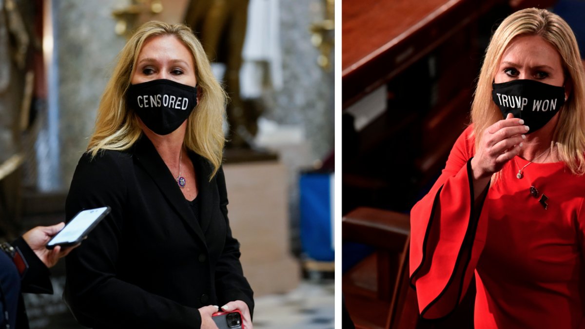 Taylor Greene bär munskydd med politiska budskap.