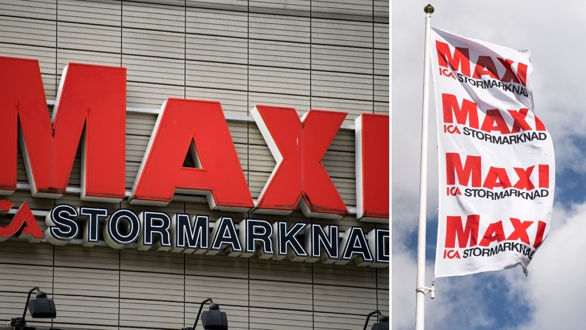 Skylt med Ica Maxi-loggan och flagga med Ica Maxi-loggan. 