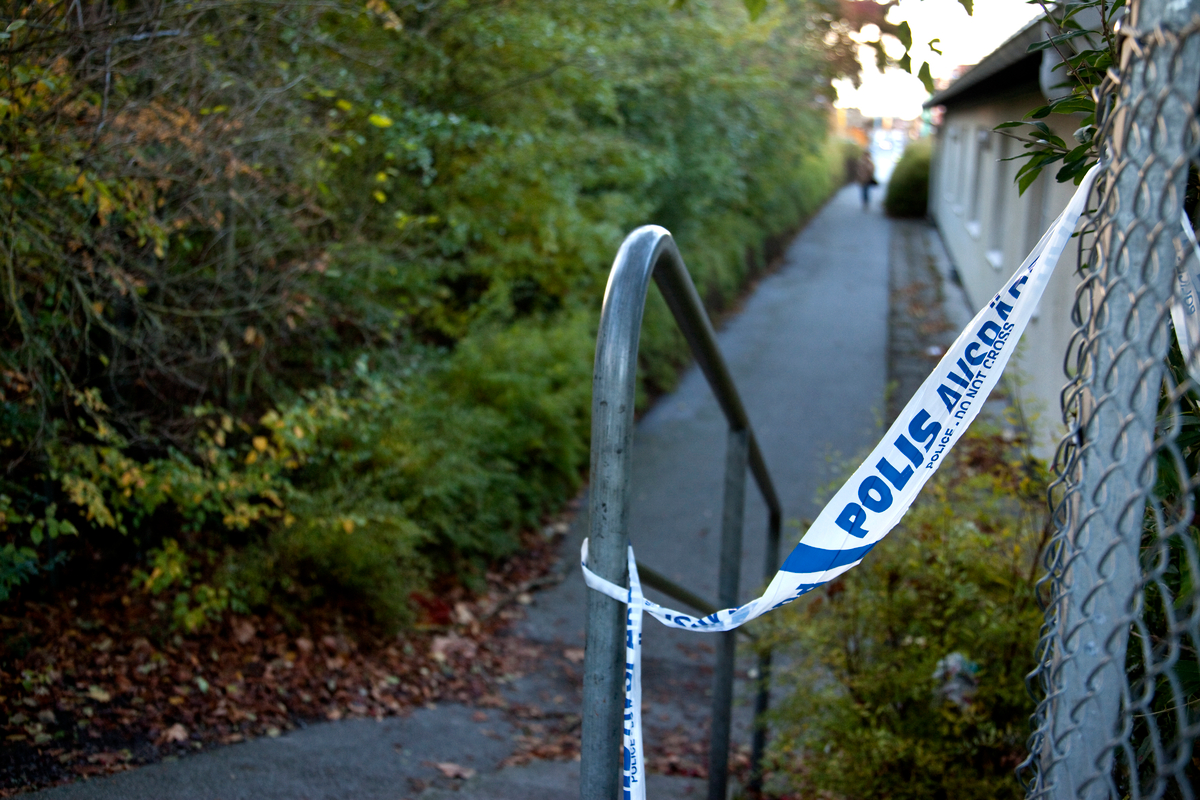 Polisavspärrningar efter ett mord 