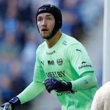 Noel Törnqvist i hjälm och Noel Törnqvist