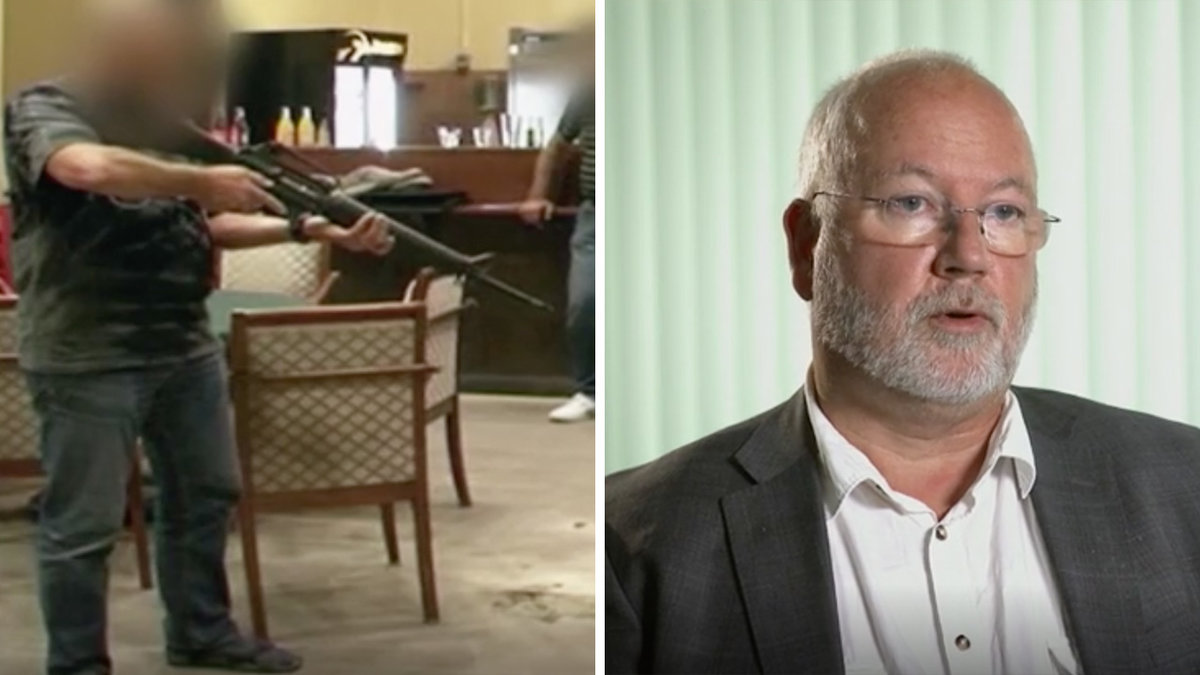 man med blurrat ansikte med automatvapen, rakad man med glasögon i kostym