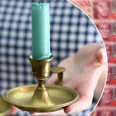 Bilder på nya sedlar och en ljusstake.