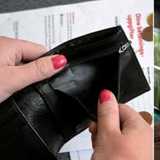 Tom plånbok och kvitto efter matköp.