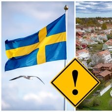 Sverigeflagga och bostadsområde med villor