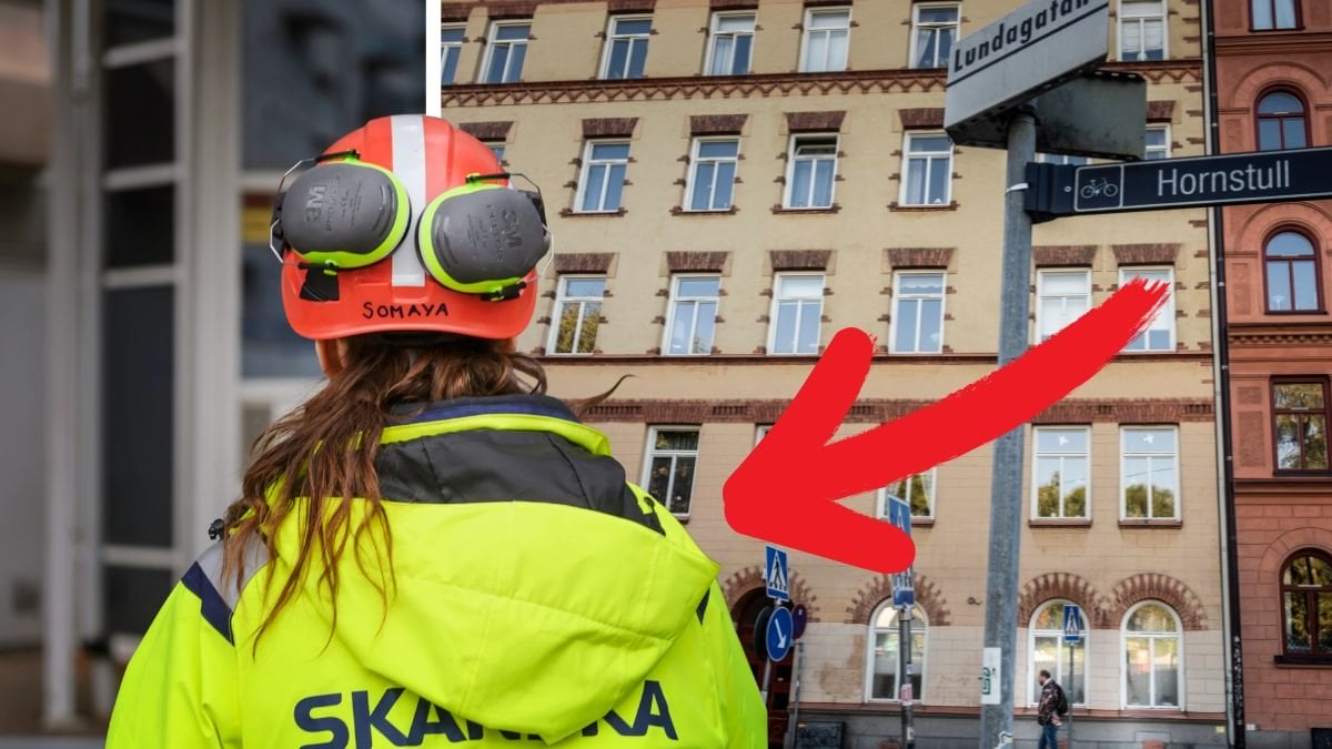 Byggarbetare och bostadshus. 