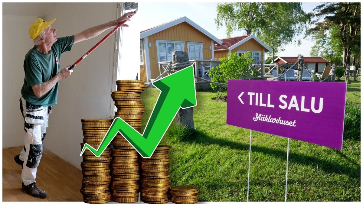 Man som målar en vägg och en Till salu-skylt utanför ett hus