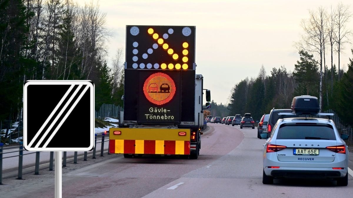 Vägmärke och bilväg.
