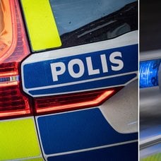 Polisbil och blåljus.