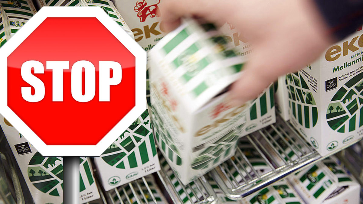 En röd stoppskylt, en hand som tar en mjölkförpackning