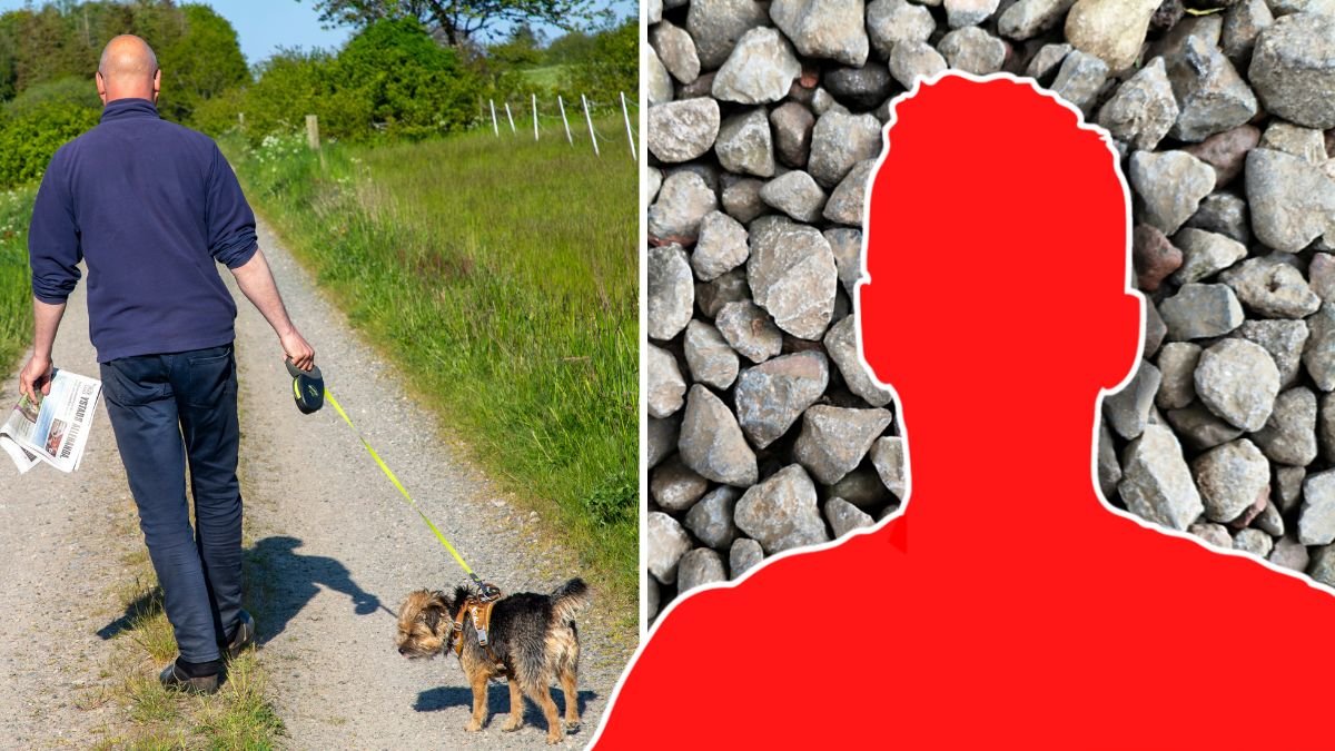 Man går på promenad med sin hund.