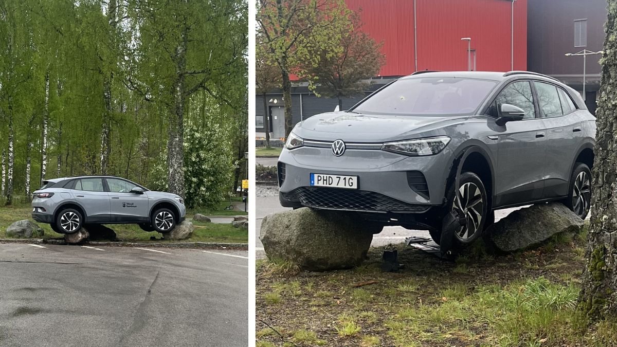 Bil som står parkerad på sten.