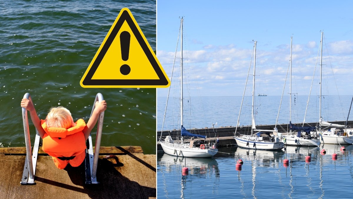 Barn med flytväst och hamn med segelbåtar