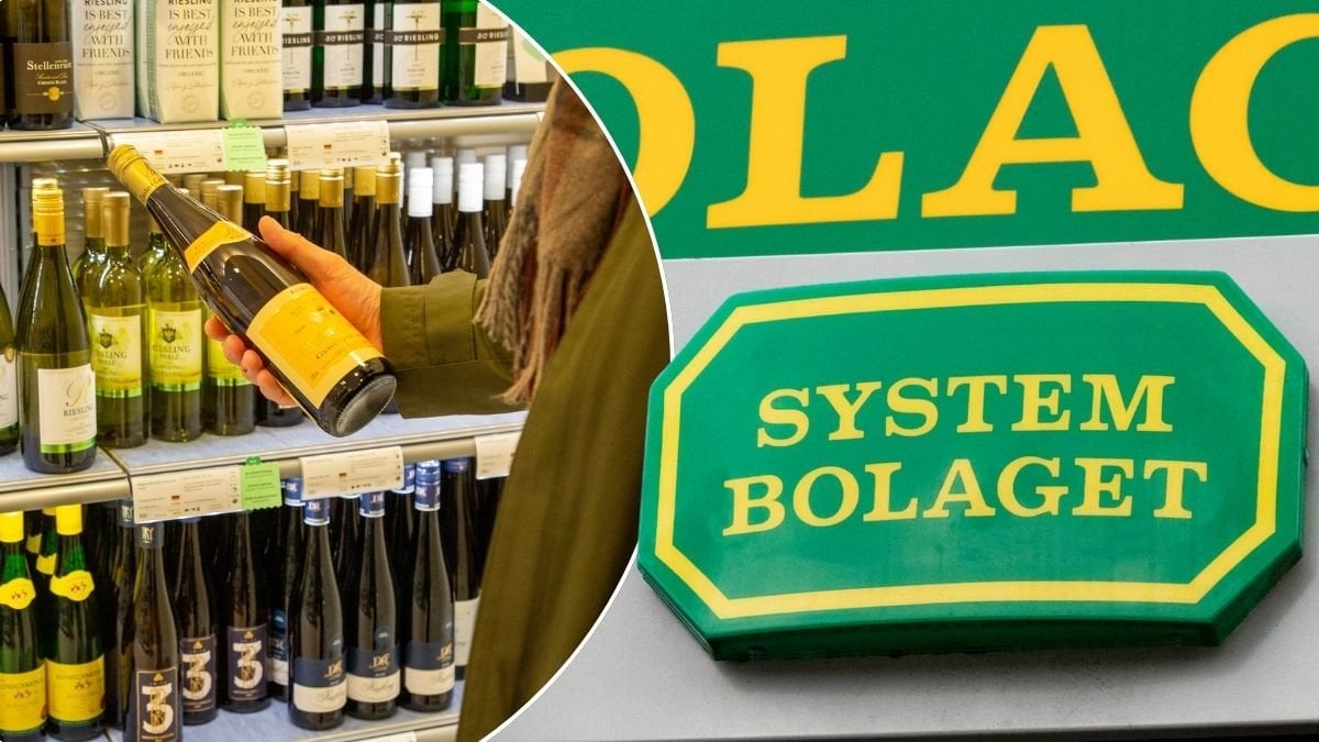 Systembolagets skylt och flaskor med vitt vin.