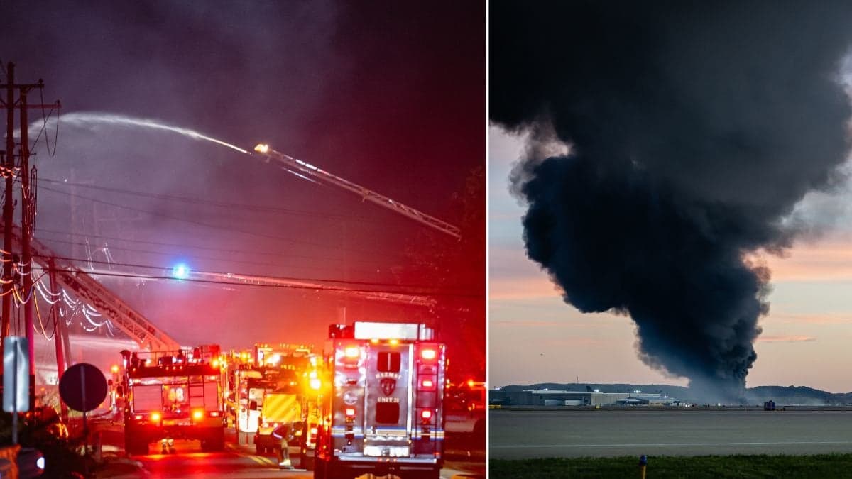 En rökpelare stiger mot himlen efter flygkraschen i Kentucky.