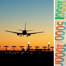 Flygplan och albanska sedlar.
