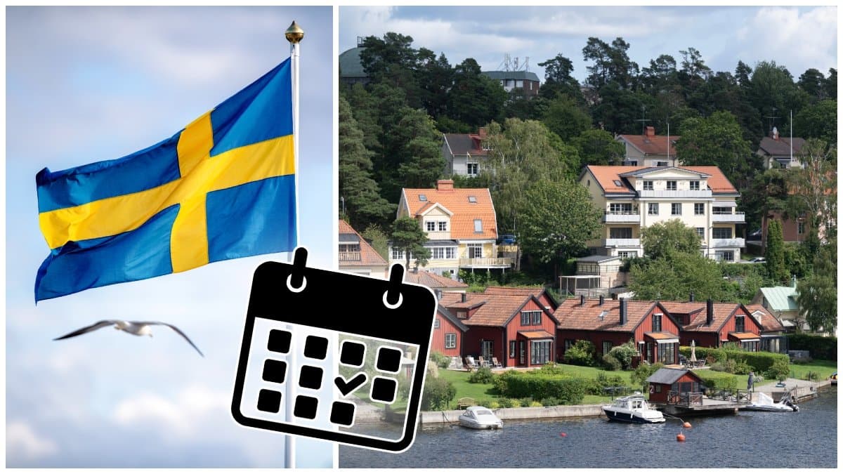 Sverigeflagga och bostäder belägna vid vatten