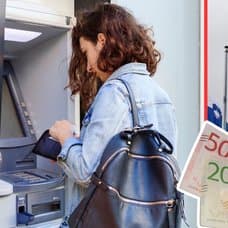 Bankomat, flaggor, pengar.