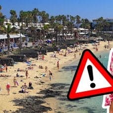 Strand på Kanarieöarna och turister