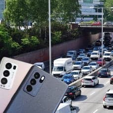 Mobiltelefon och bilkö.