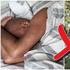 Man sover och röd stuga.