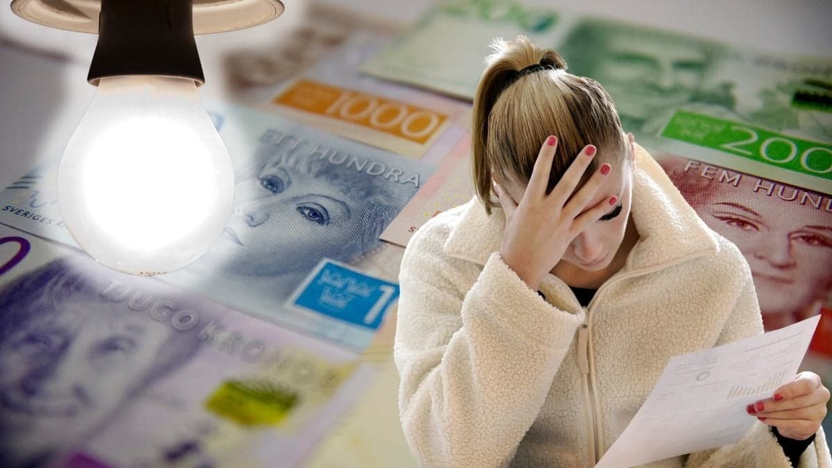 Pengar, glödlampa och kvinna med en faktura i handen.