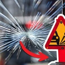 Stenskott och kvinna som kör bil.