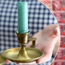 Bilder på nya sedlar och en ljusstake.