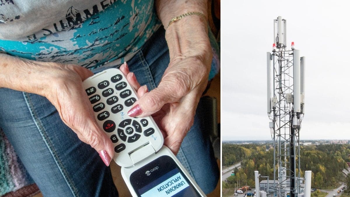 Äldre kvinna med knapptelefon och en basstation för mobiltelefoni.