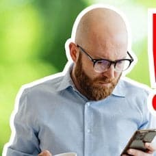 Man med mobiltelefon