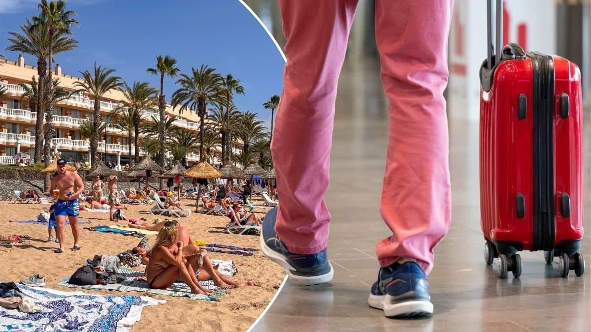 En röd resväska och en sandstrand.