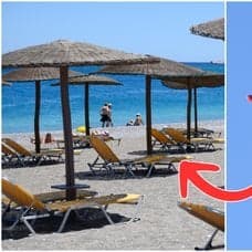 Sandstrand och flygplan i luften.