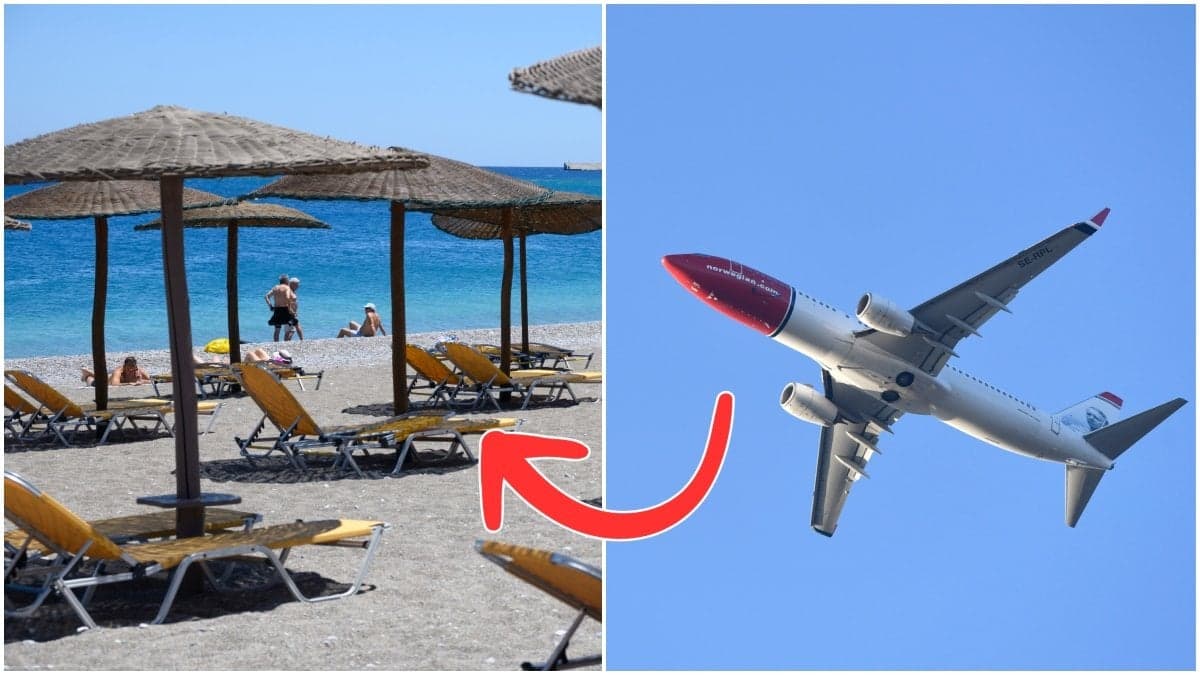 Sandstrand och flygplan i luften.