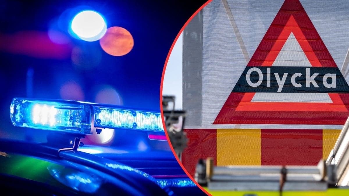 Polisbil och olyckaskylt.