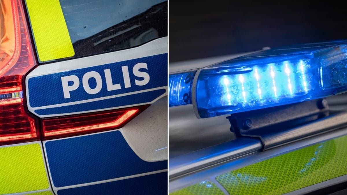 Polisbil och blåljus.