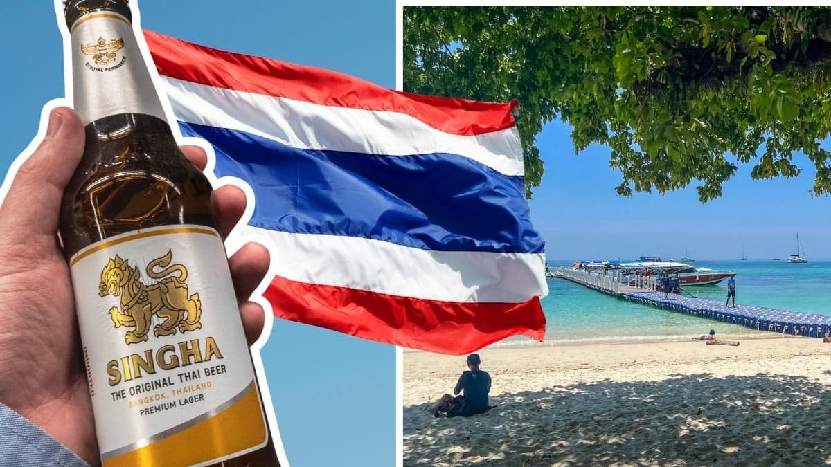 Thailändsk Singha-öl, thailändsk flagga och en starnd i Thailand