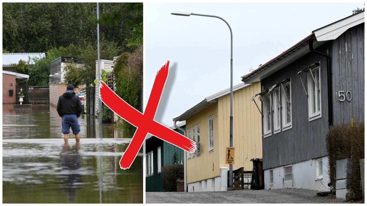 Man som vadar i vatten i ett villaområde och flera småhus