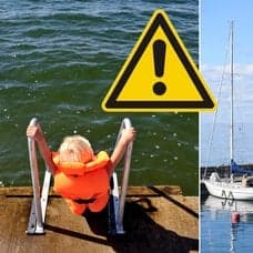 Barn med flytväst och hamn med segelbåtar