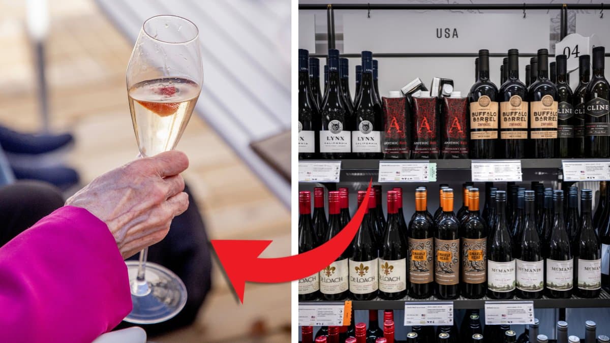 Pensionär håller i ett glas bubbel och vinhylla.