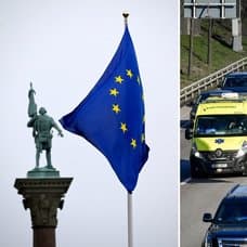 EU-flagga och bilkö på en motorväg.