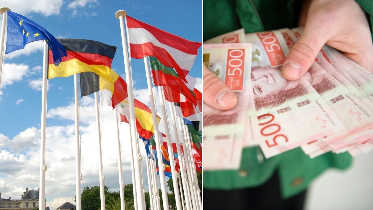 EU-flaggor och en person med massor av femhundralappar i handen.