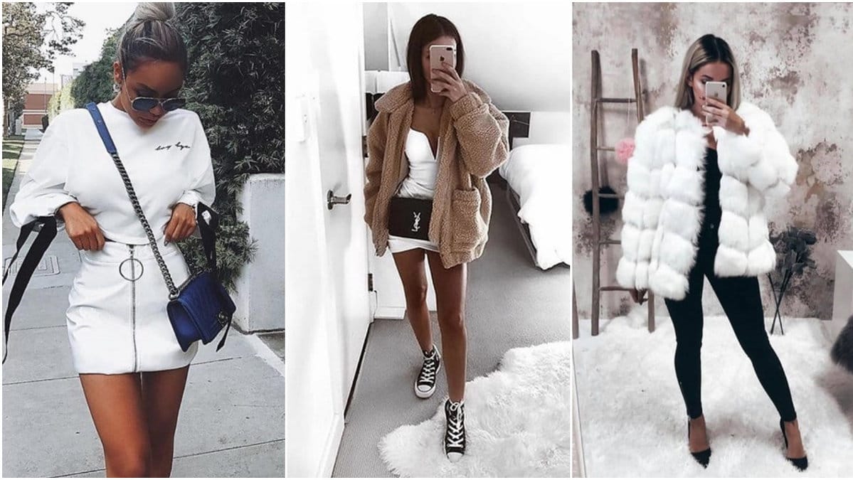 Tre kvinnor klädda i jacka med mobil i handen. 