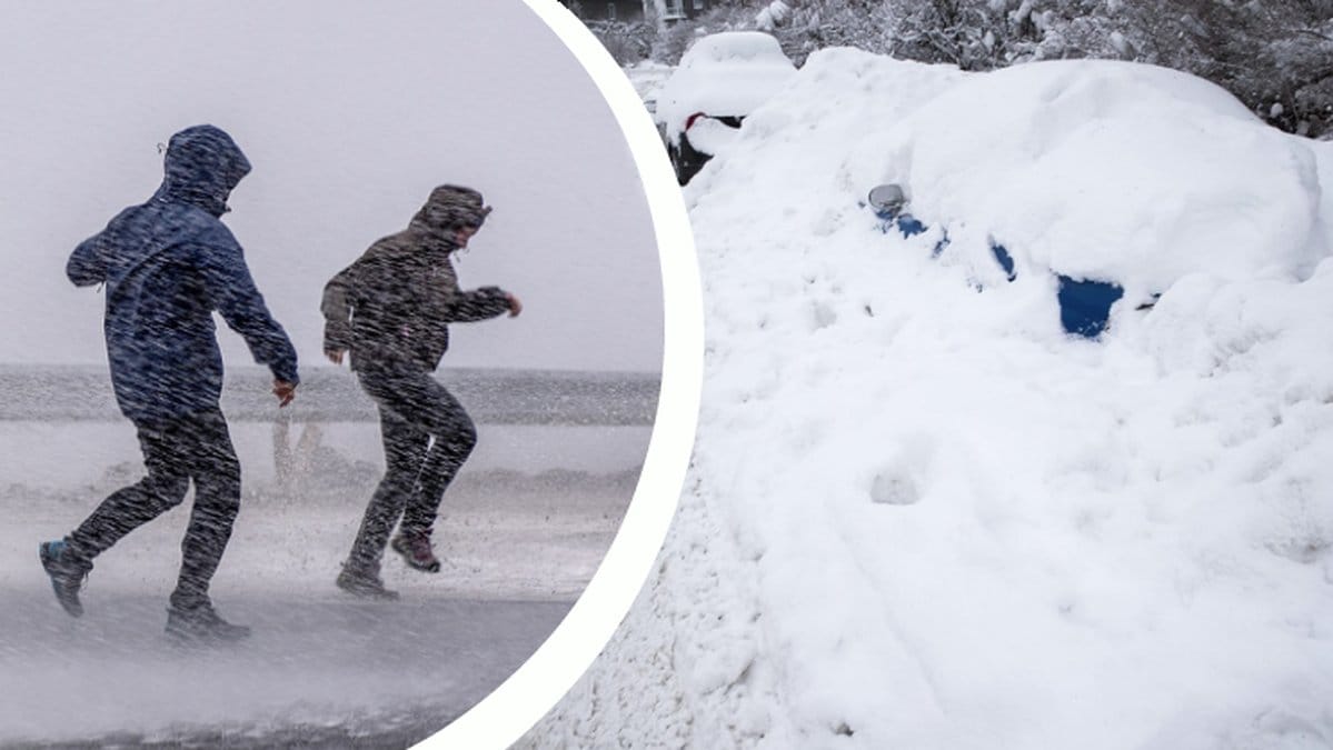 folk går i storm. insnöad bil