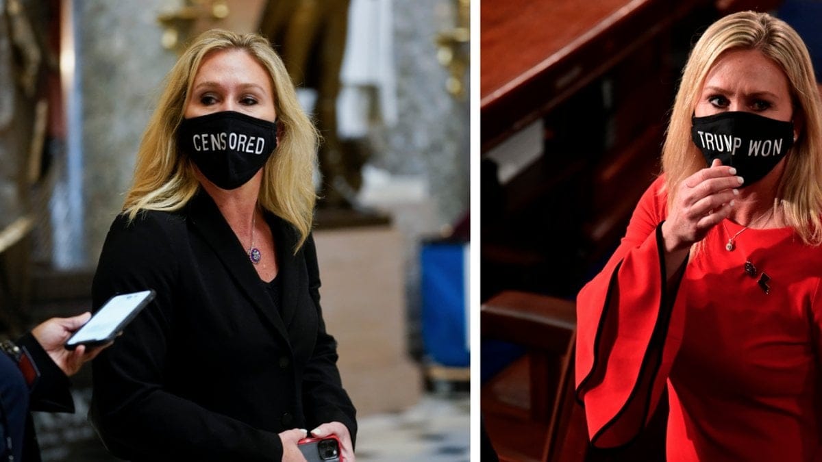 Taylor Greene bär munskydd med politiska budskap.