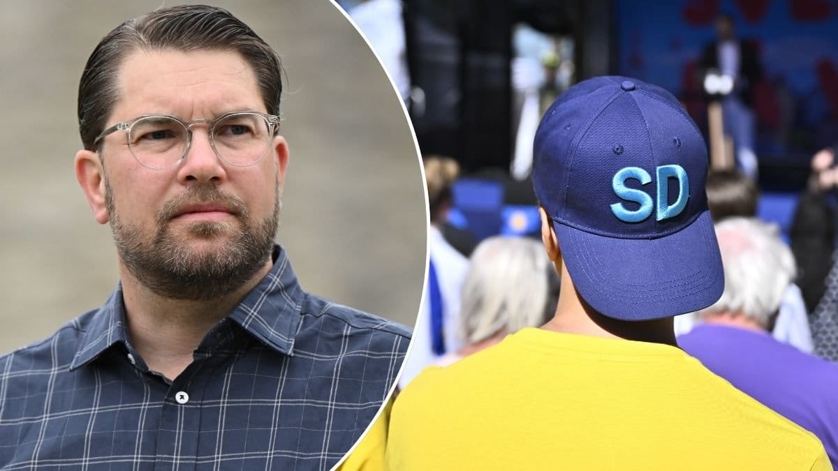 Bild på Jimmie Åkesson och en man med SD-keps.