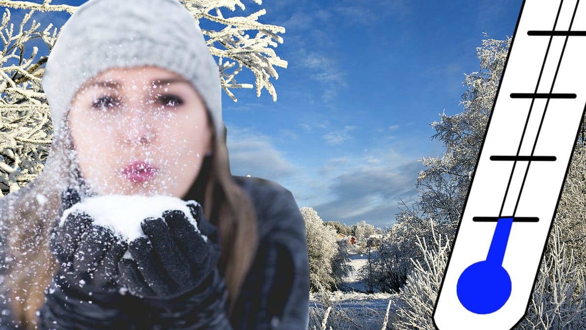 Tjej blåses snö med temperatur och frost i bakgrunden